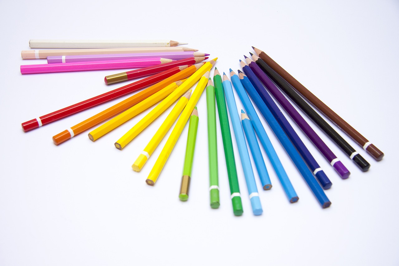 a rainbow of colored pencils arranged in a circle, a color pencil sketch, crayon art, product introduction photo