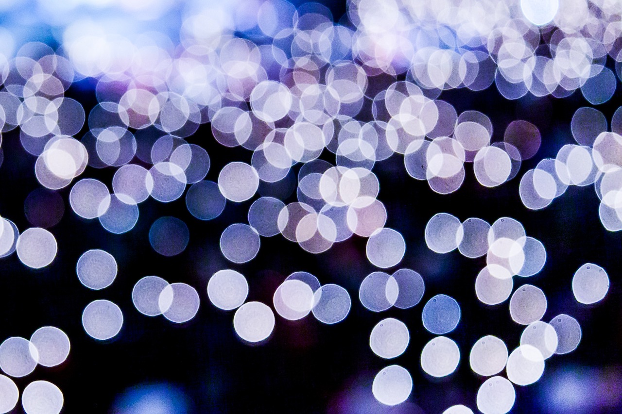 a blurry photo of a bunch of lights, a picture, by Jan Rustem, pexels, pointillism, dramatic white and blue lighting, flickr explore 5 0 mm, soft purple glow, telephoto shot