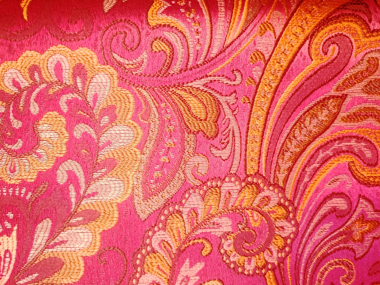 a close up of a pink and gold fabric, baroque, red wallpaper background, very vibrant, hyperdetailed colourful, ((intricate))