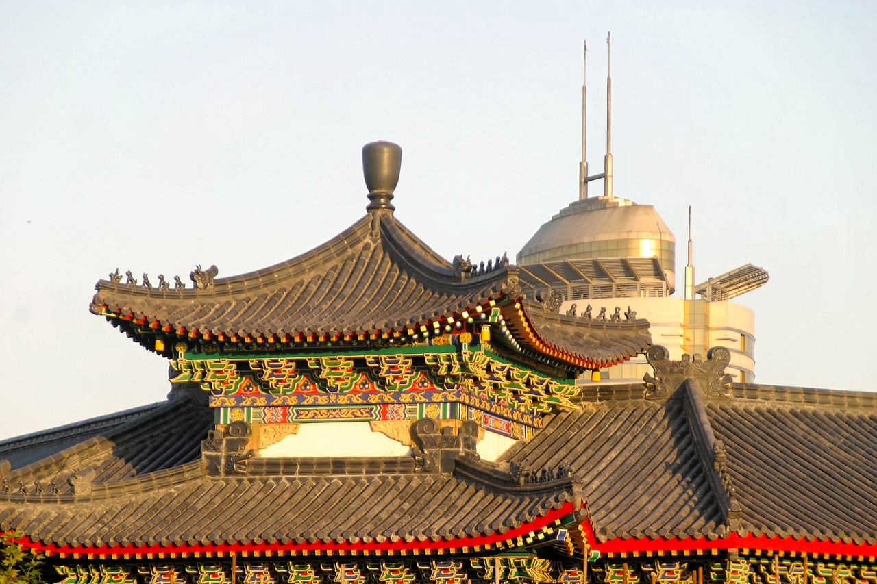 a large building with a clock on top of it, a picture, inspired by Zhang Sengyao, flickr, cloisonnism, rooftop, golden hour in beijing, minarets, closeup photo