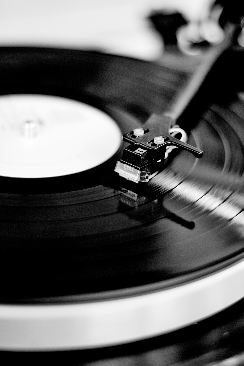a black and white photo of a record player, fine art, modern high sharpness photo