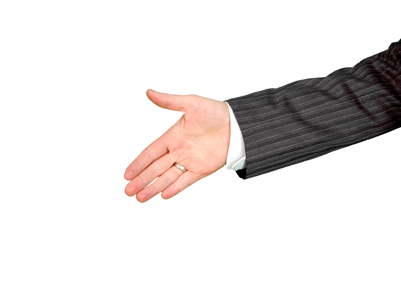 a man in a suit holding out his hand, a stock photo, by Julian Allen, on black background, accurate detail, shaking hands, women