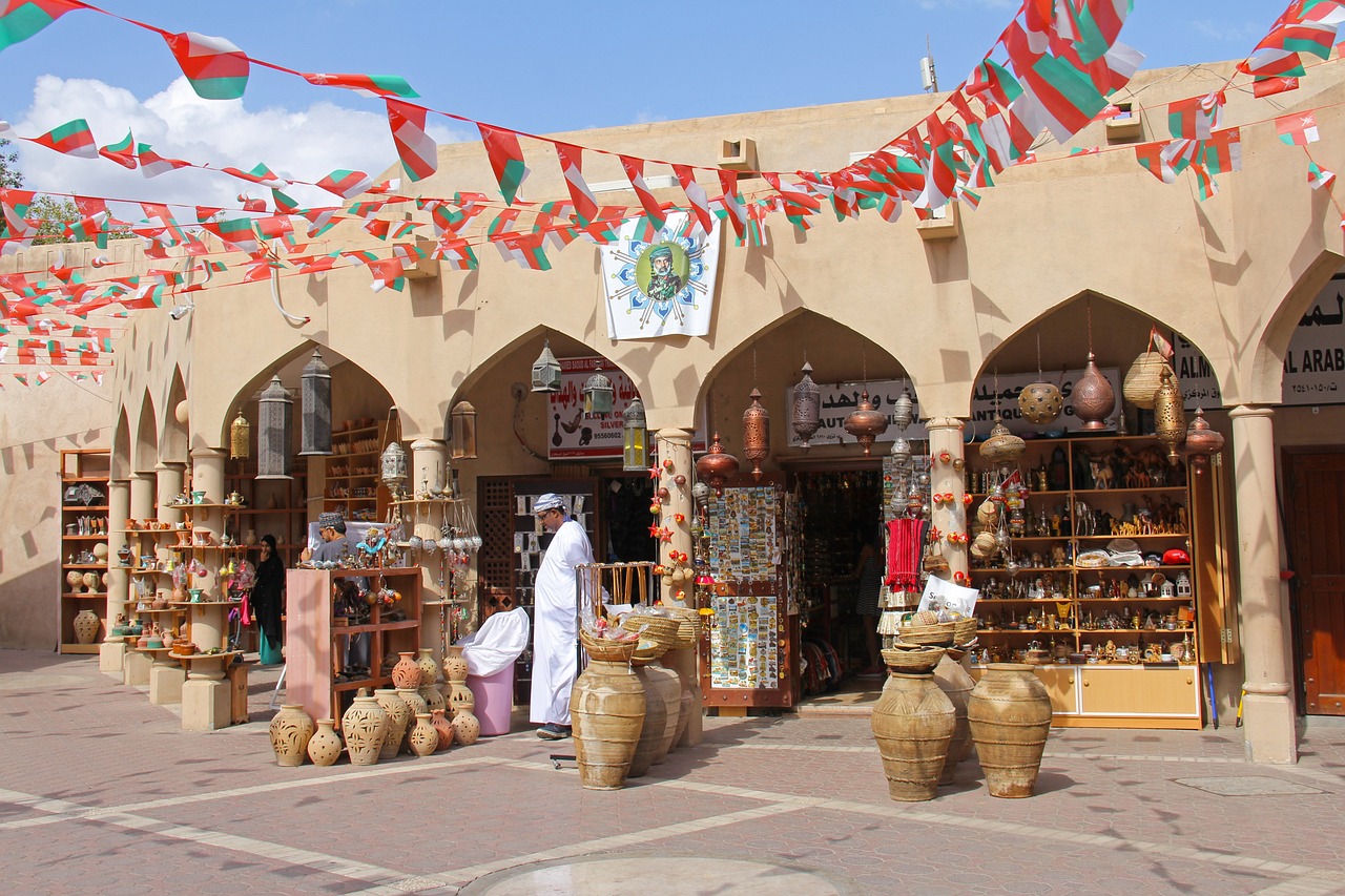 a group of people standing in front of a store, by Abraham Begeyn, shutterstock, hurufiyya, oman, crafts and souvenirs, there are archways, usa-sep 20