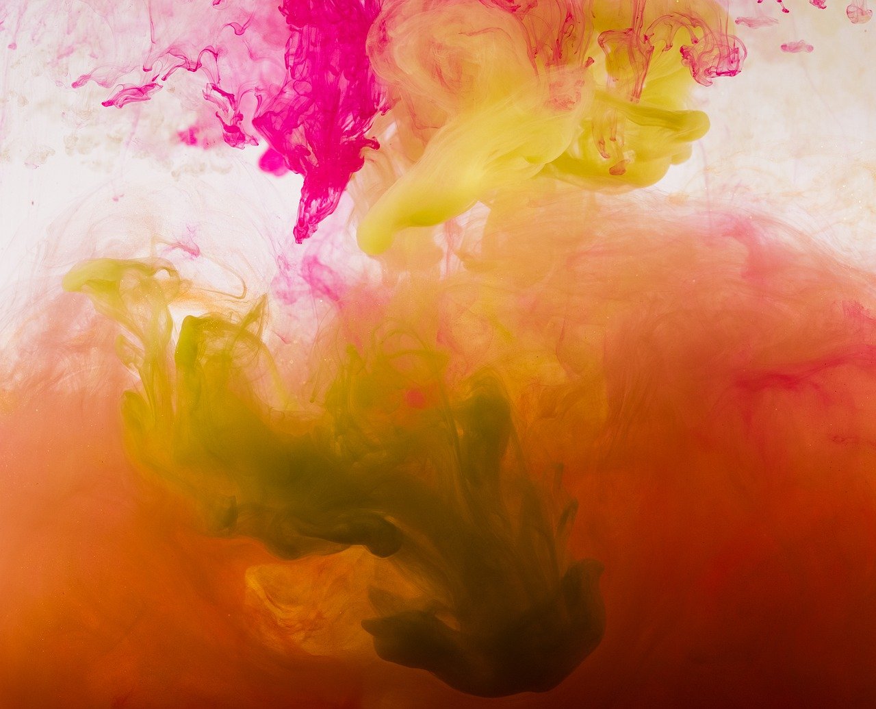 a close up of colored ink in water, inspired by Kim Keever, abstract art, dynamic colorful background, faded red and yelow, splashes of neon clouds, paint is falling off