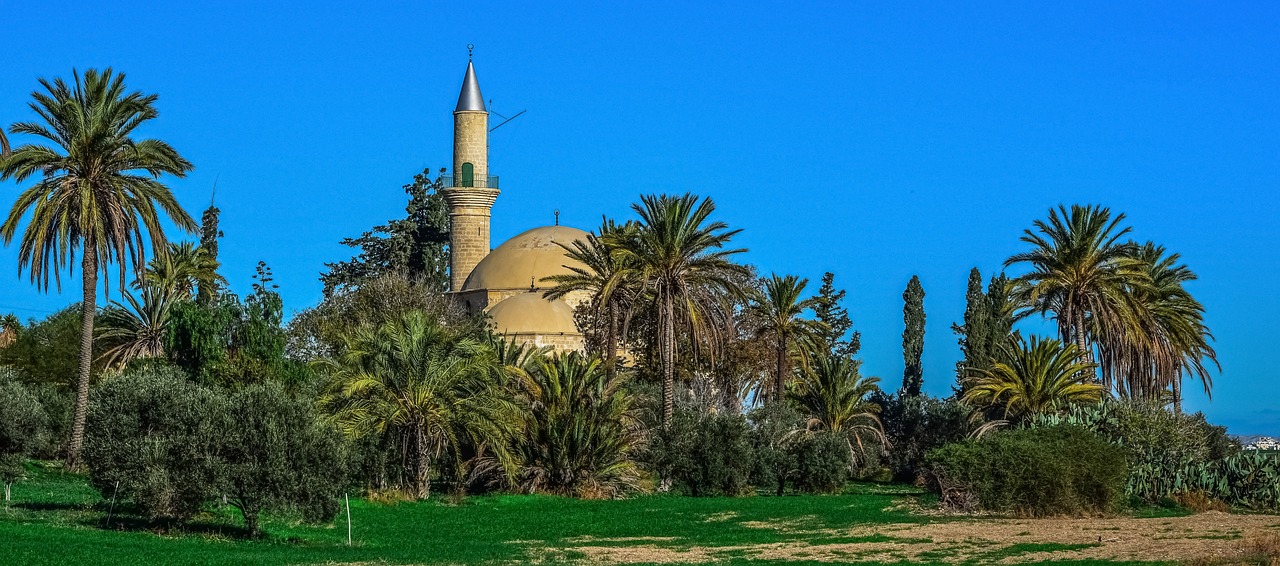 a large yellow mosque surrounded by palm trees, by Zahari Zograf, shutterstock, les nabis, cyprus, city park, hdr photo, tombs