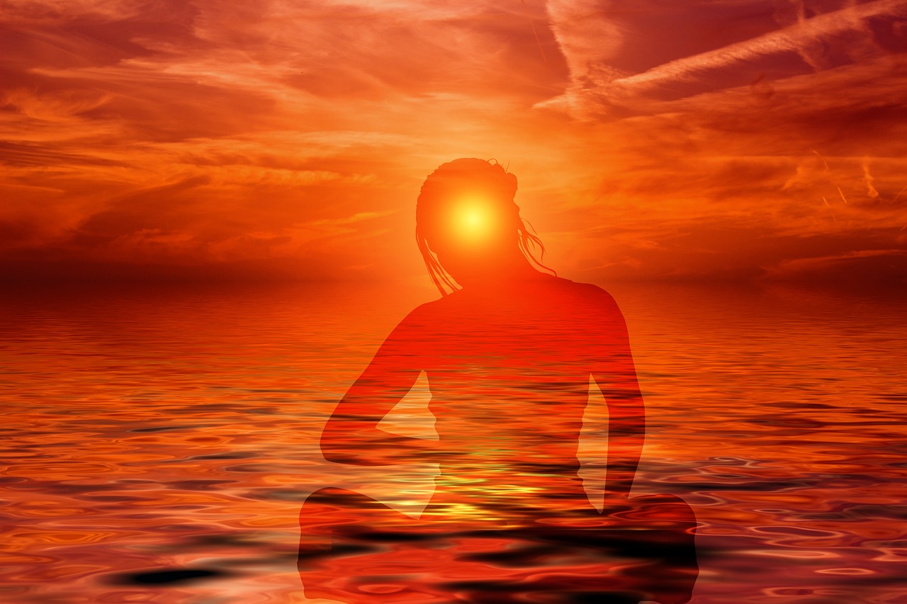 a woman sitting in the middle of a body of water, digital art, epic red - orange sunlight, sacral chakra, siluette, background is heavenly