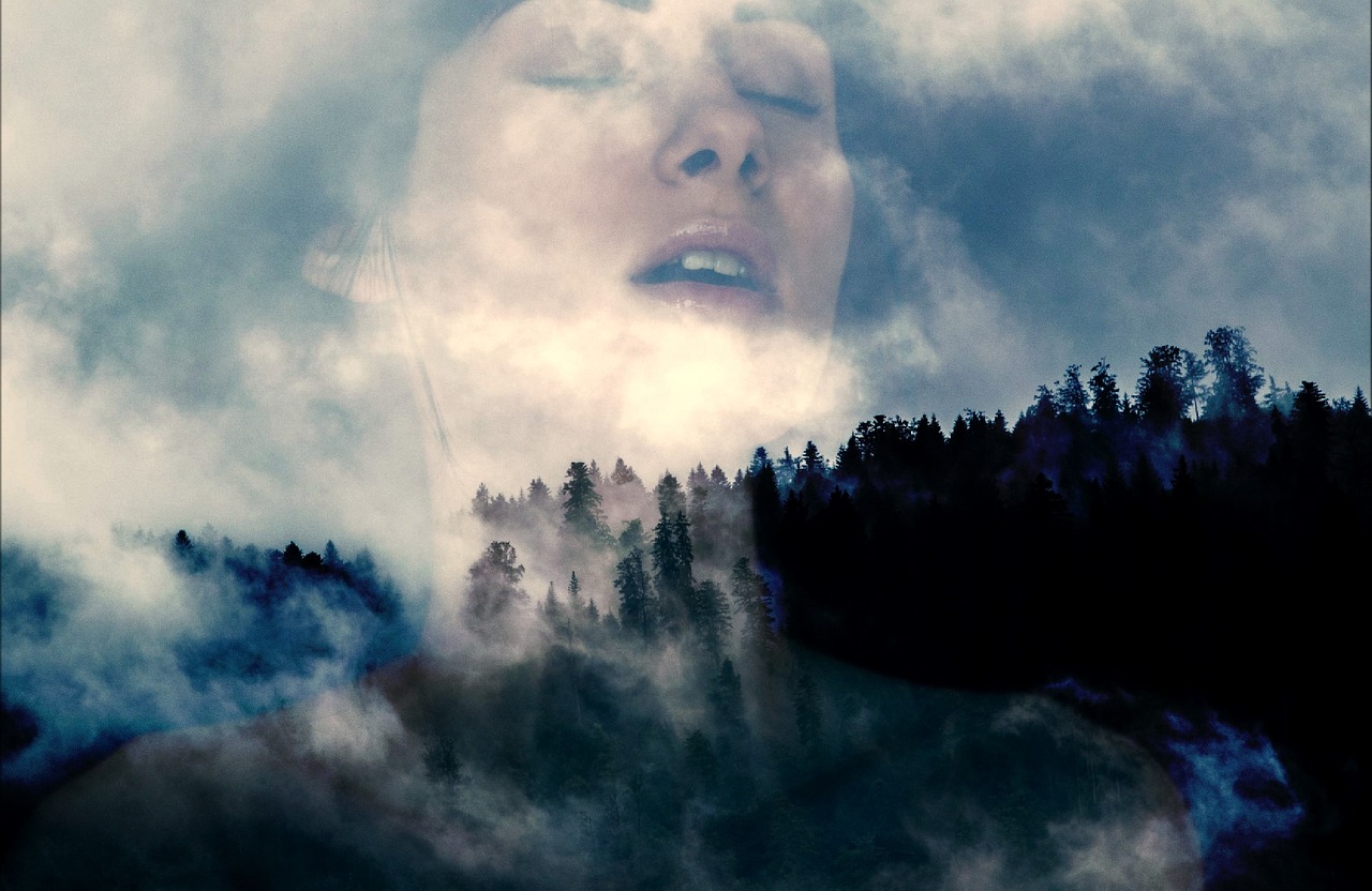 a woman with her eyes closed standing in front of a forest, by Lucia Peka, romanticism, face in the clouds, distorted photo, a mountain look like a women, devouring the human soul