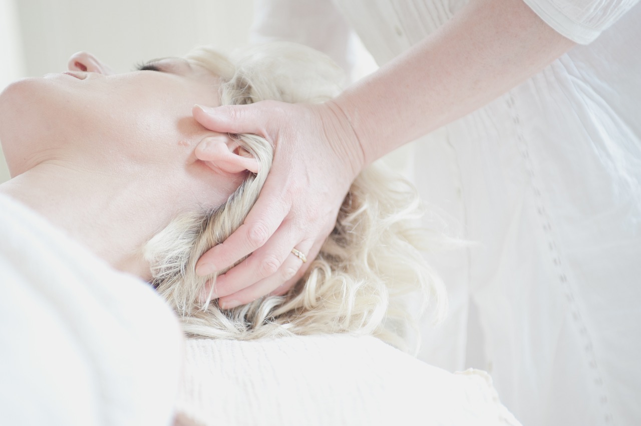 a woman getting a massage at a spa, a photo, aestheticism, messy wavy white hair, high res photo, ethereal details, dlsr photo