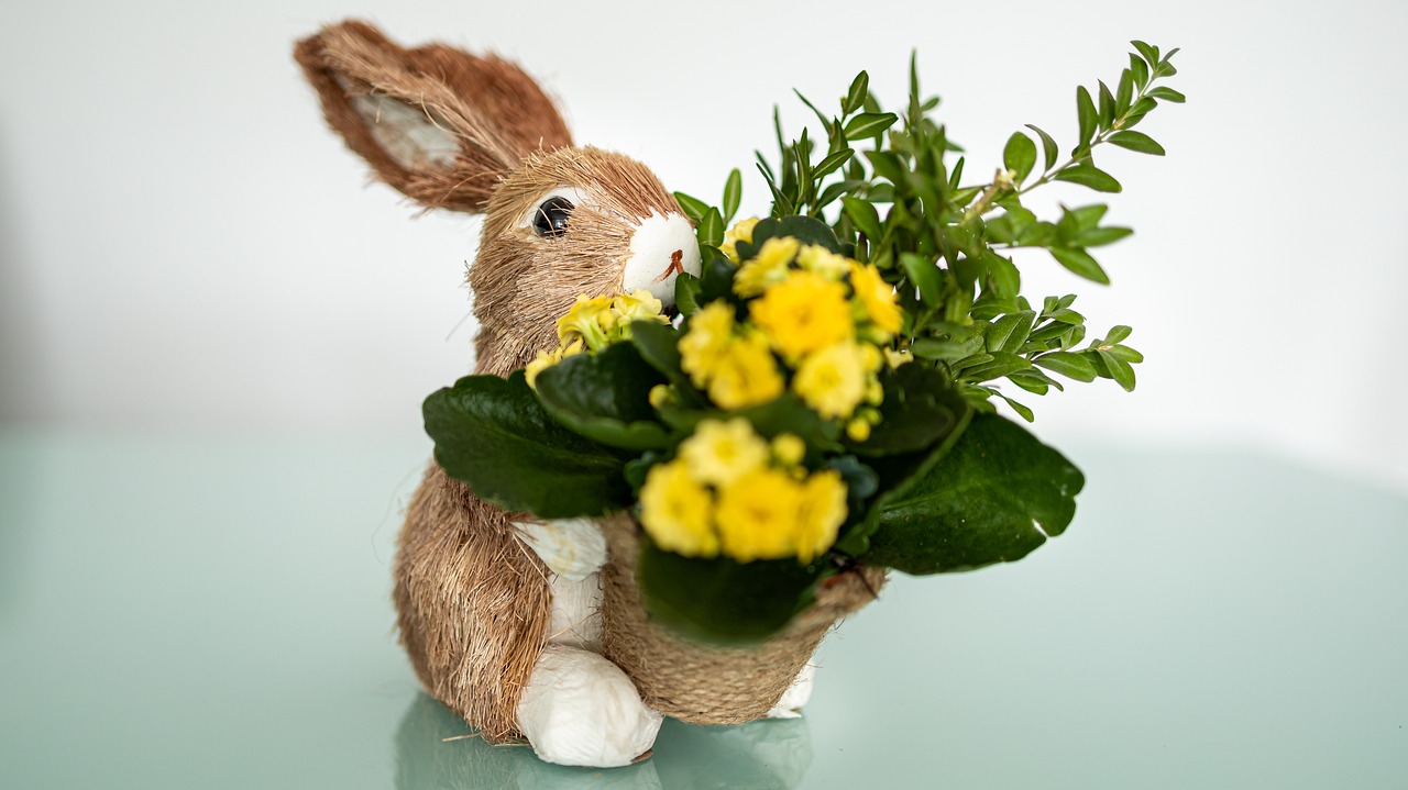 a stuffed rabbit holding a bouquet of flowers, a picture, by Maksimilijan Vanka, pixabay, avatar image, pot, commercial product photography, 🦩🪐🐞👩🏻🦳