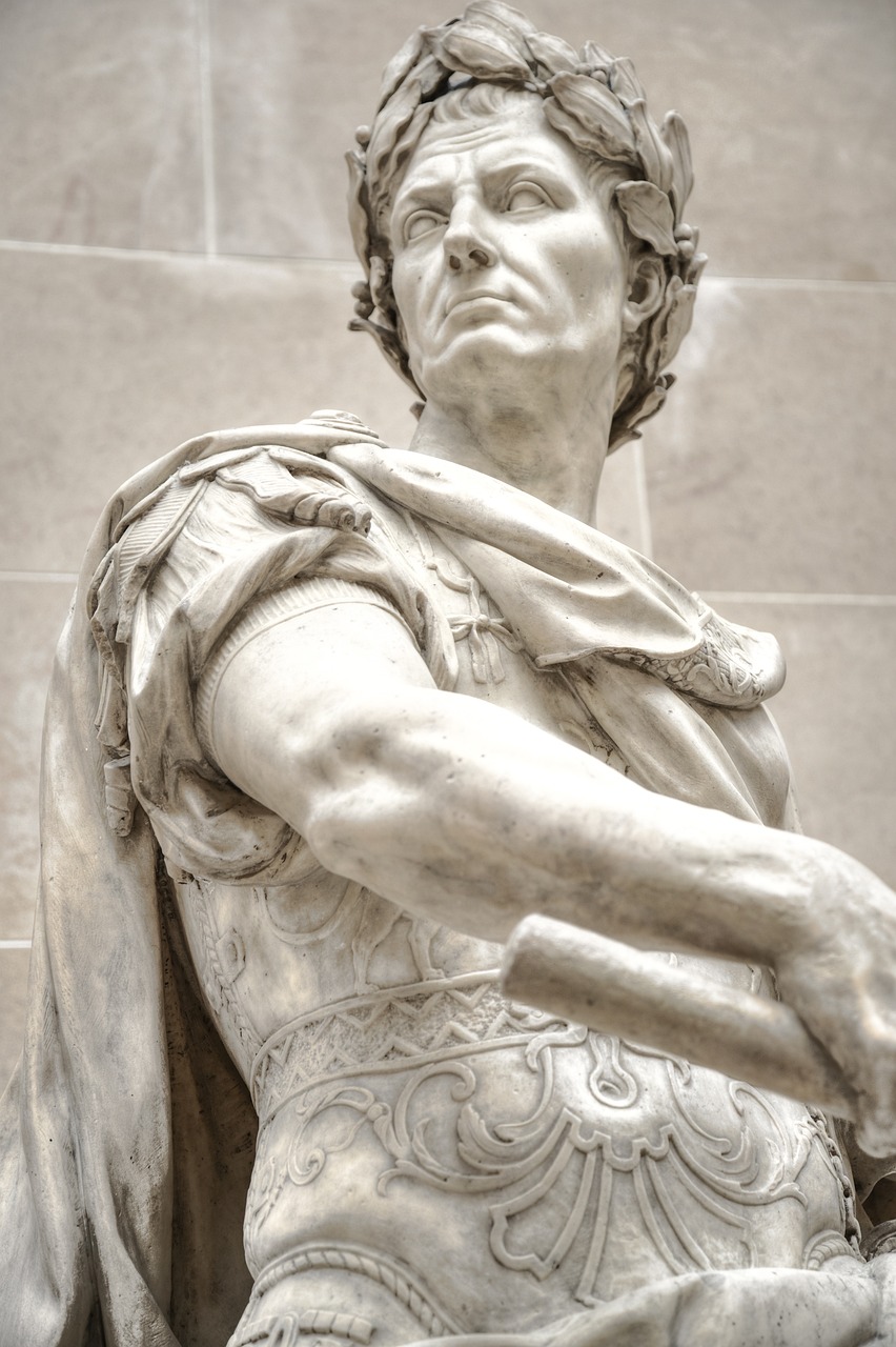 a close up of a statue of a man, a marble sculpture, inspired by Pogus Caesar, shutterstock, high detail photo, jacques louis david style, traditional roman armor, on his right hand