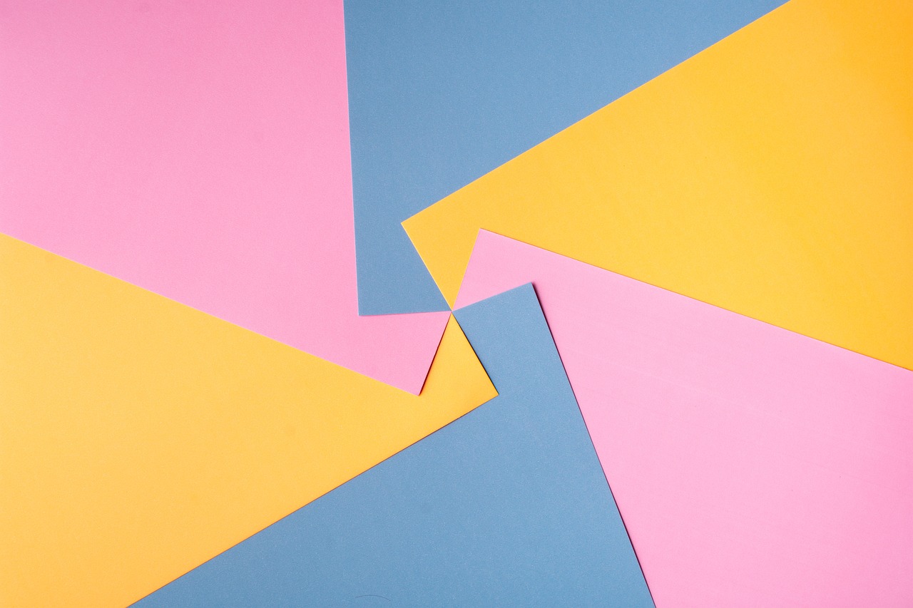 a bunch of different colored papers laying on top of each other, abstract illusionism, pink and yellow, geometric figures, background yellow and blue, artem