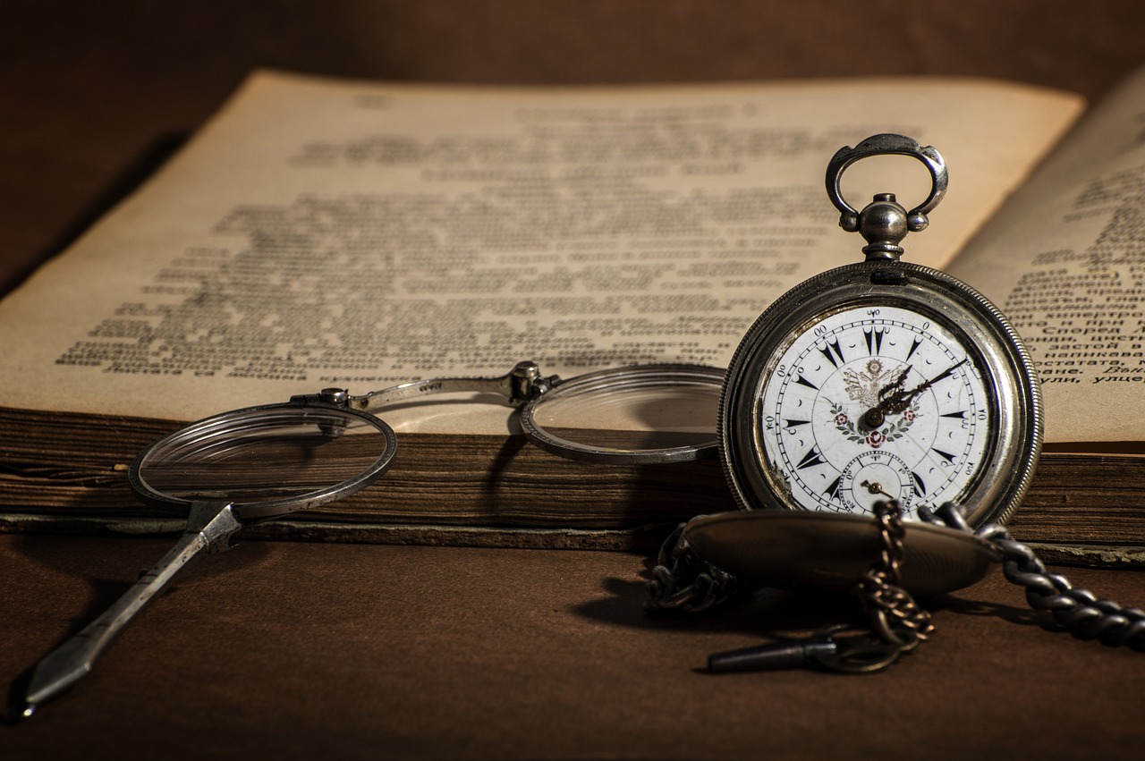 a pocket watch sitting on top of an open book, by Aleksander Gierymski, today\'s featured photograph 4k, miscellaneous objects, spectacles, beautiful wallpaper