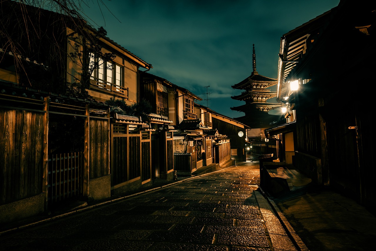 a street at night with a pagoda in the background, unsplash contest winner, feudal era japan, hard morning light, 6 4 0, preserved historical