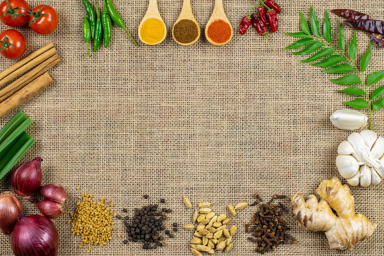 a variety of spices and herbs arranged in a circle, a stock photo, pexels, burlap, relaxed. gold background, in style of thawan duchanee, full length shot