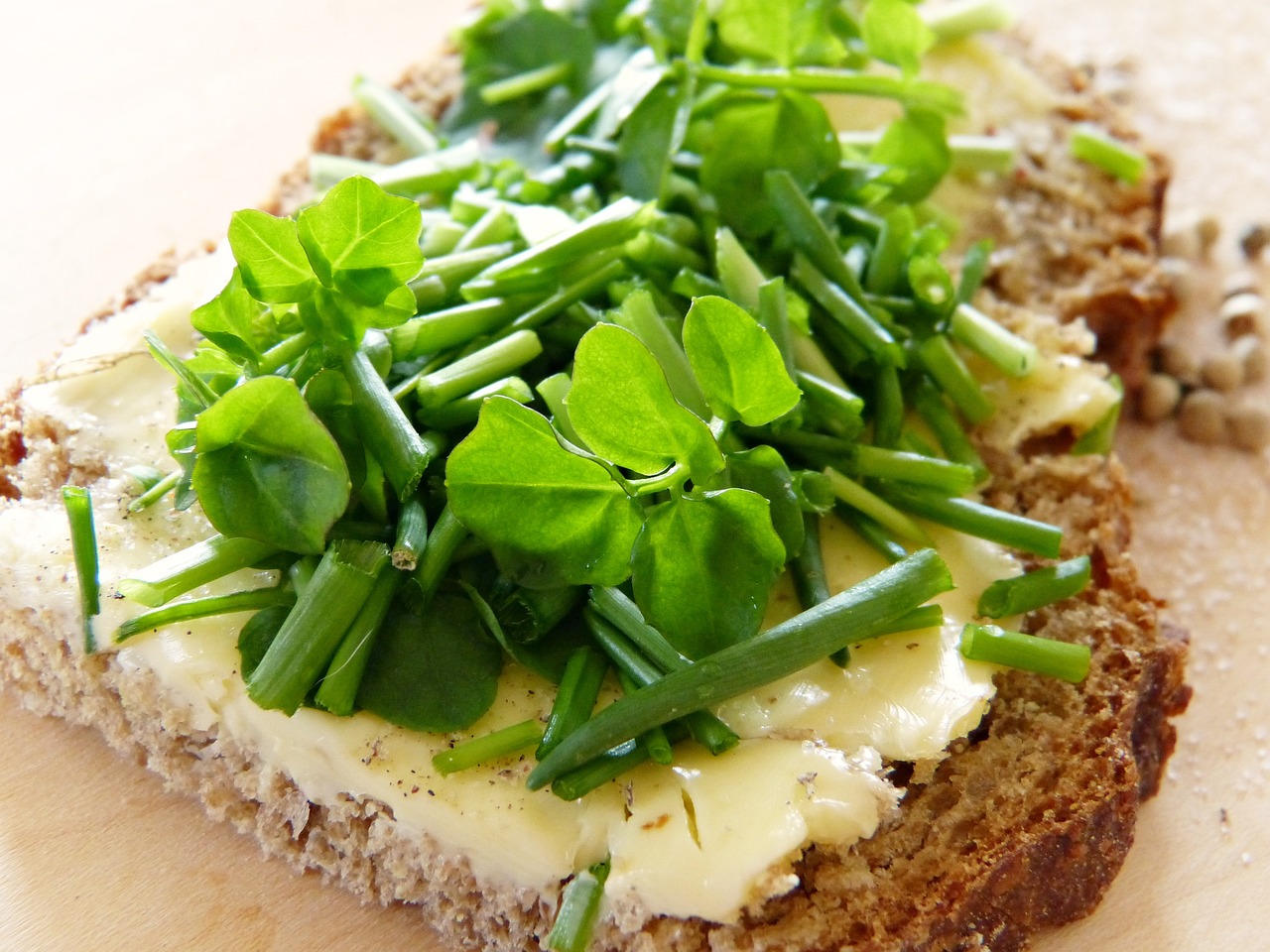 a piece of bread topped with greens and cheese, by Dietmar Damerau, pexels, art nouveau, clover, flax, !!highly detalied, william open