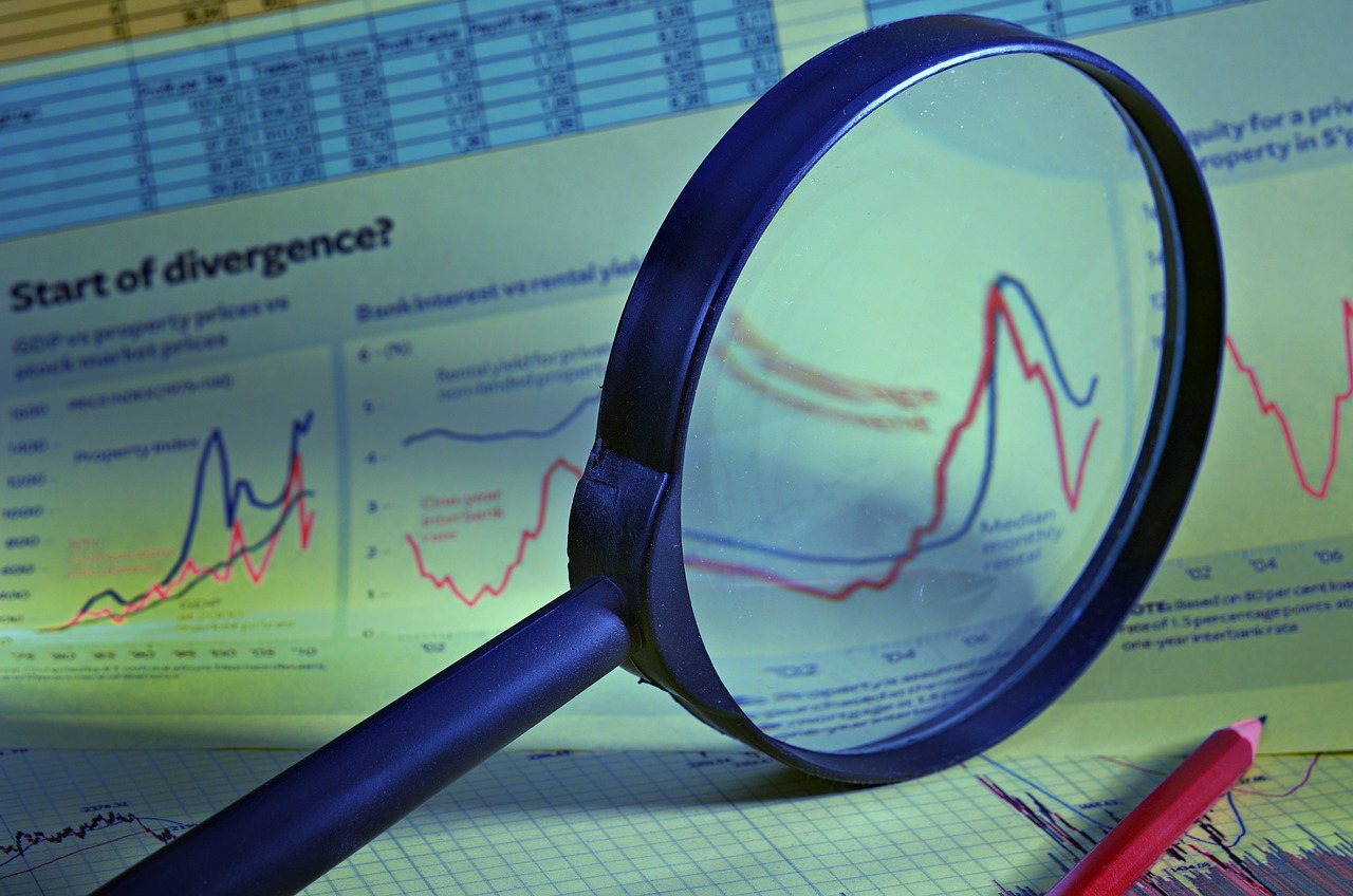 a magnifying glass sitting on top of a piece of paper, a picture, by Stefan Gierowski, analytical art, graphs, bank, shock, fim still