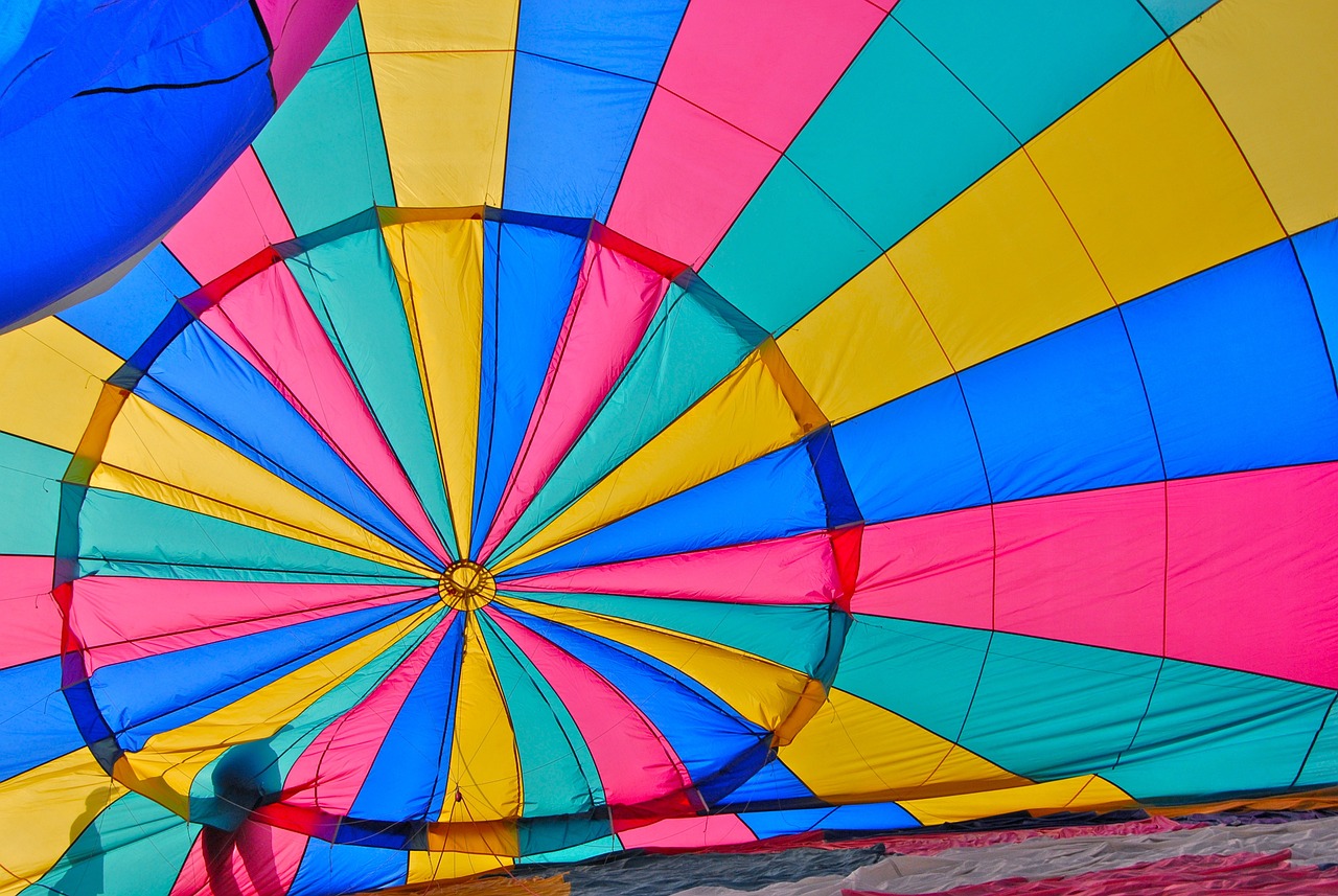 the inside of a colorful hot air balloon, a photo, color field, turquoise pink and yellow, colorful umbrella, colorful”
