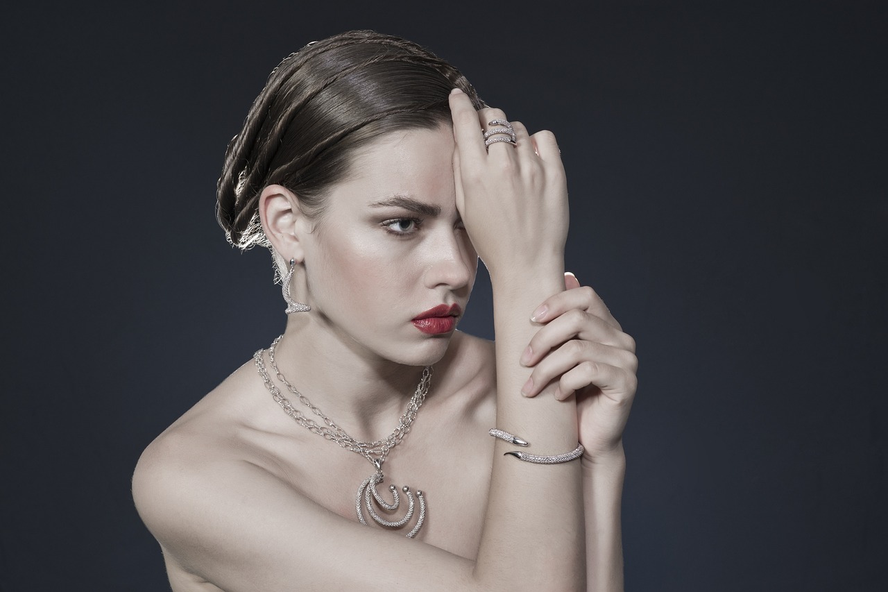 a woman is posing with her hands on her head, trending on cg society, bauhaus, silver necklace, bulgari, “diamonds, moonlit