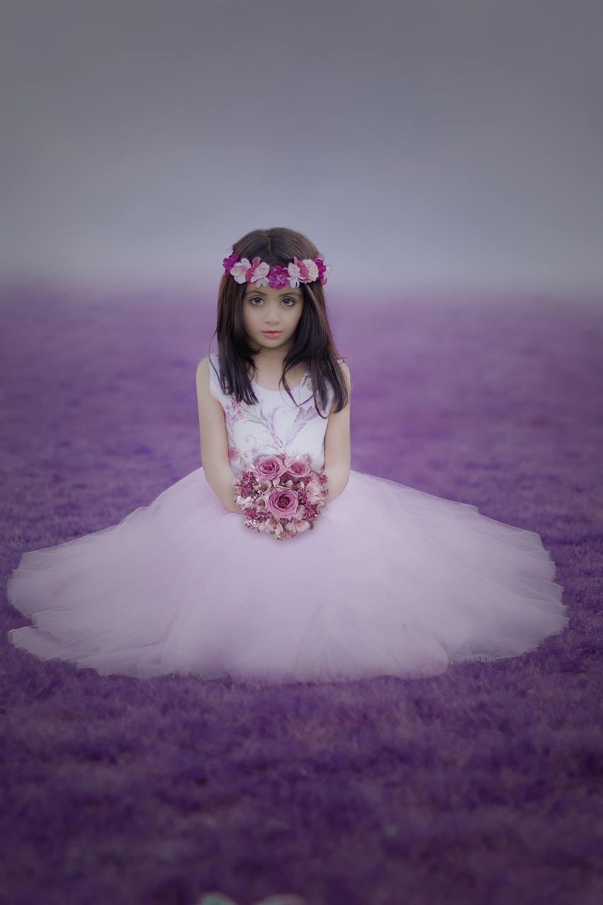 a girl in a white dress holding a bouquet of flowers, a colorized photo, inspired by Lilia Alvarado, pixabay contest winner, wearing purple romantic tutu, high quality fantasy stock photo, sitting pose, beautiful pink little girl