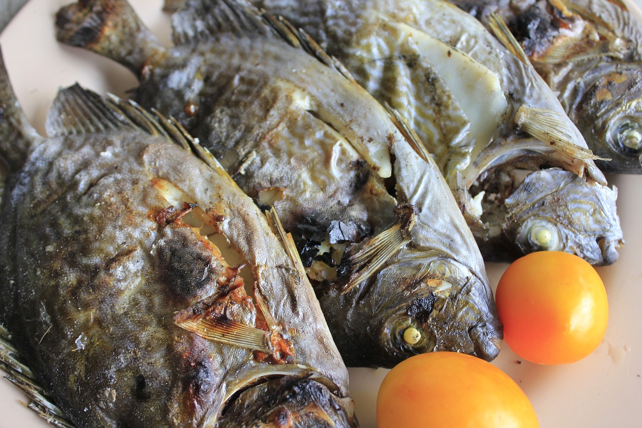a plate that has some kind of fish on it, pixabay, mingei, pus - filled boils, harvest, 🦩🪐🐞👩🏻🦳, crisp detail