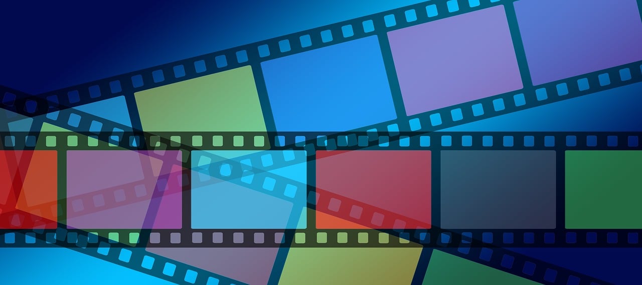 a close up of a film strip on a blue background, a picture, pixabay, video art, multicolored vector art, green blue red colors, rectangular, information