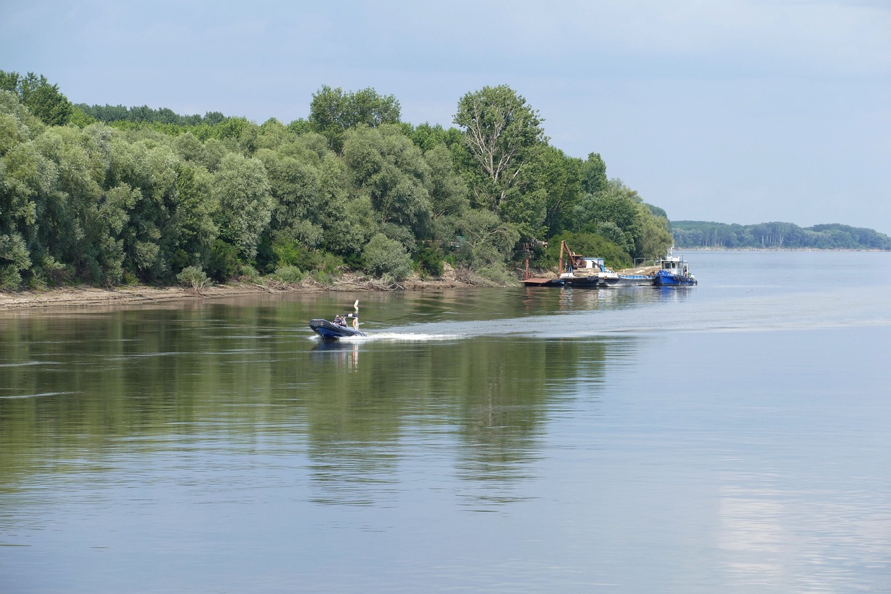 a couple of boats that are in the water, a picture, shutterstock, danube school, southern slav features, people at work, very wide shot, bucklebury ferry