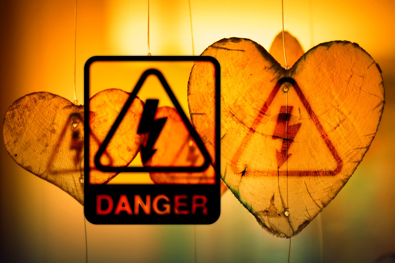 a couple of heart shaped signs hanging from strings, a stock photo, by Dietmar Damerau, pexels, shock art, high voltage warning sign, pc screenshot, photo-shopped, closeup portrait