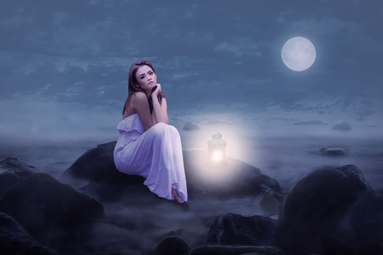 a woman in a white dress sitting on a rock, shutterstock, romanticism, night with moon and candle, enhanced photo, lantern light besides, beautiful sexy woman photo