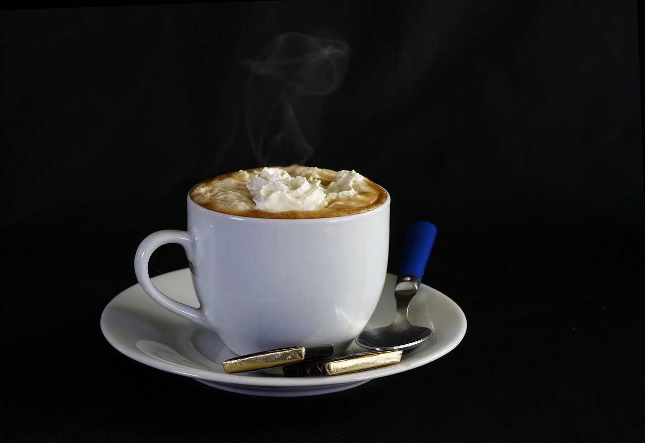 a cup of coffee sitting on top of a saucer, by John Murdoch, flickr, romanticism, subject action: smoking a cigar, whipped cream, highly detailed product photo, high detail product photo