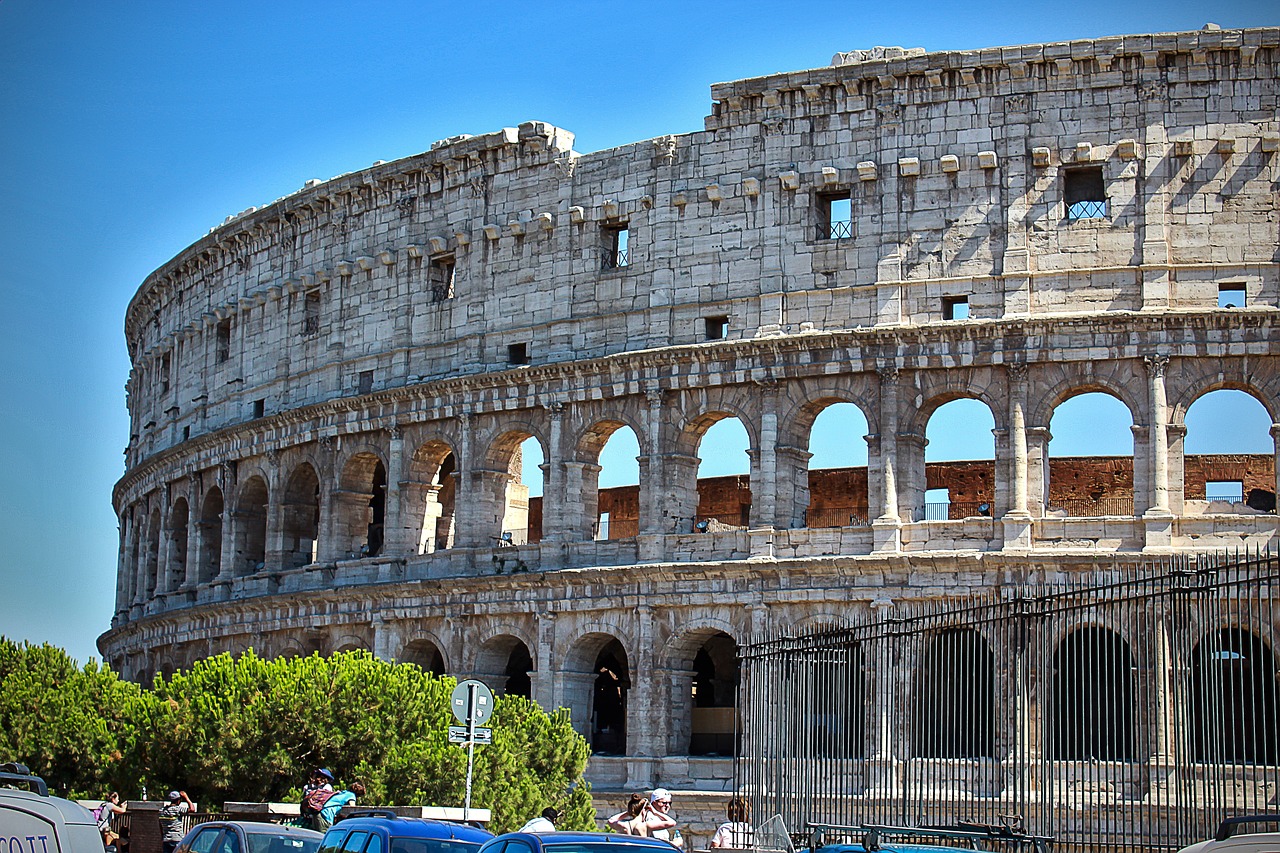 a group of cars that are parked in front of a building, by Pogus Caesar, pexels contest winner, neoclassicism, inside the roman colliseum, wikipedia, huge support buttresses, marker”