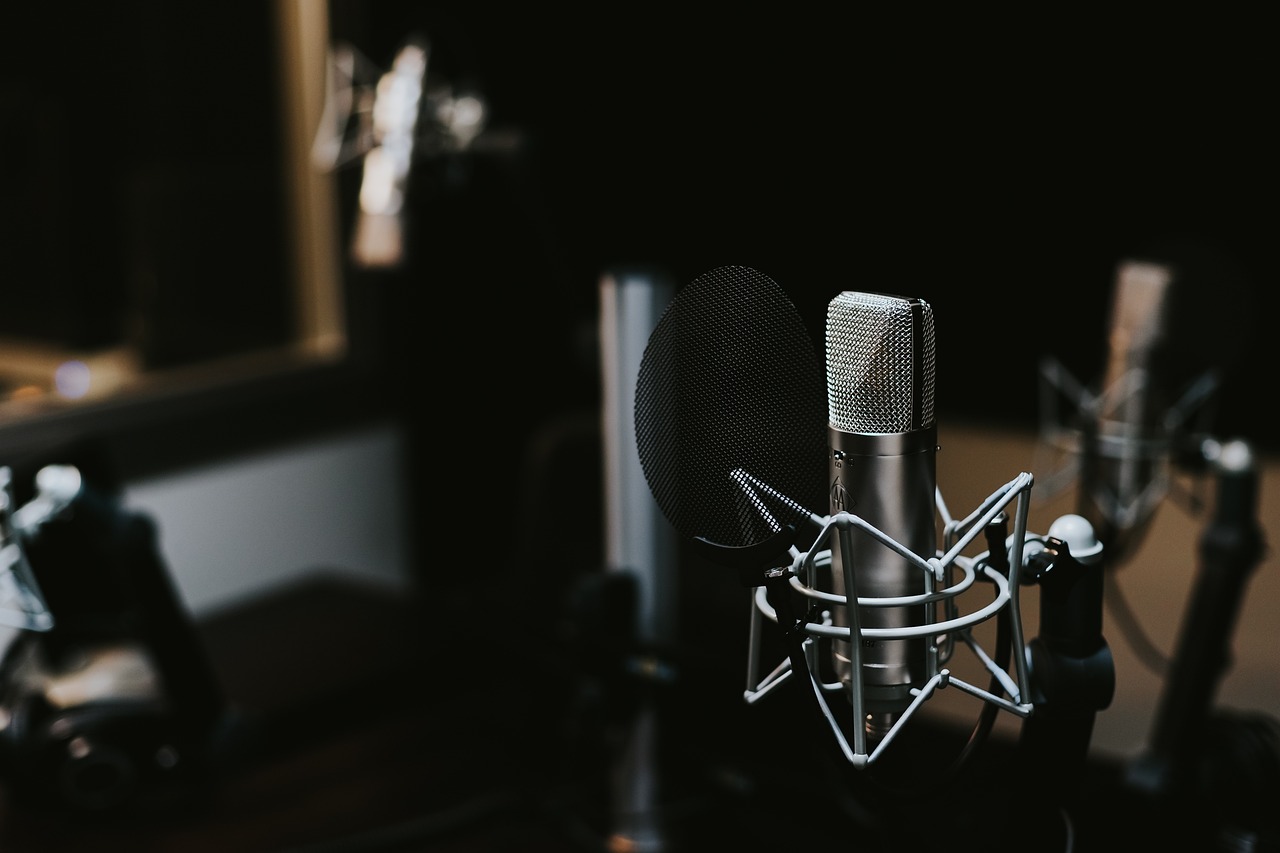 a close up of a microphone in a recording studio, an album cover, by Sebastian Vrancx, shutterstock, purism, in a black empty studio hollow, audio equipments, live broadcast, how to