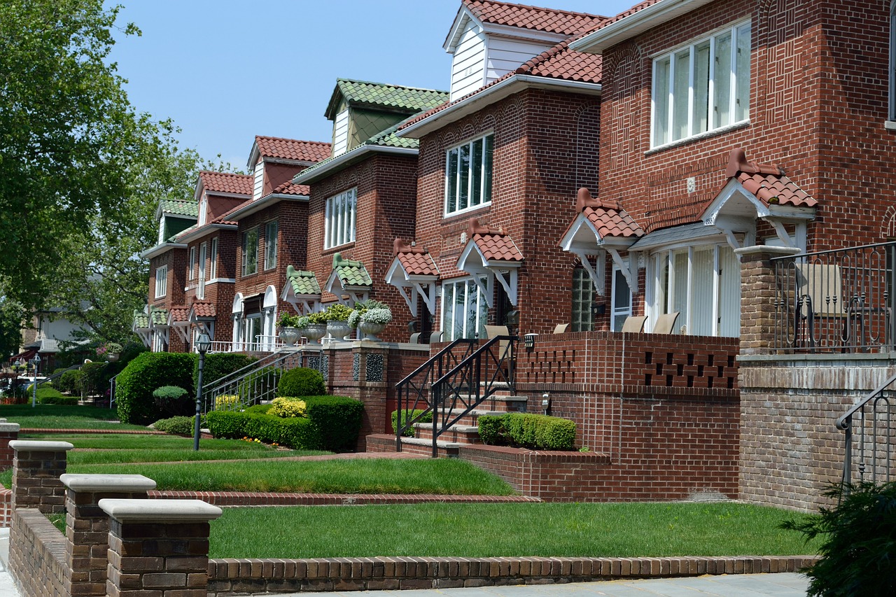 a row of brick houses on a residential street, a photo, by Loren Munk, shutterstock, new jersey, elaborate detail, modern very sharp photo, very detailed photo