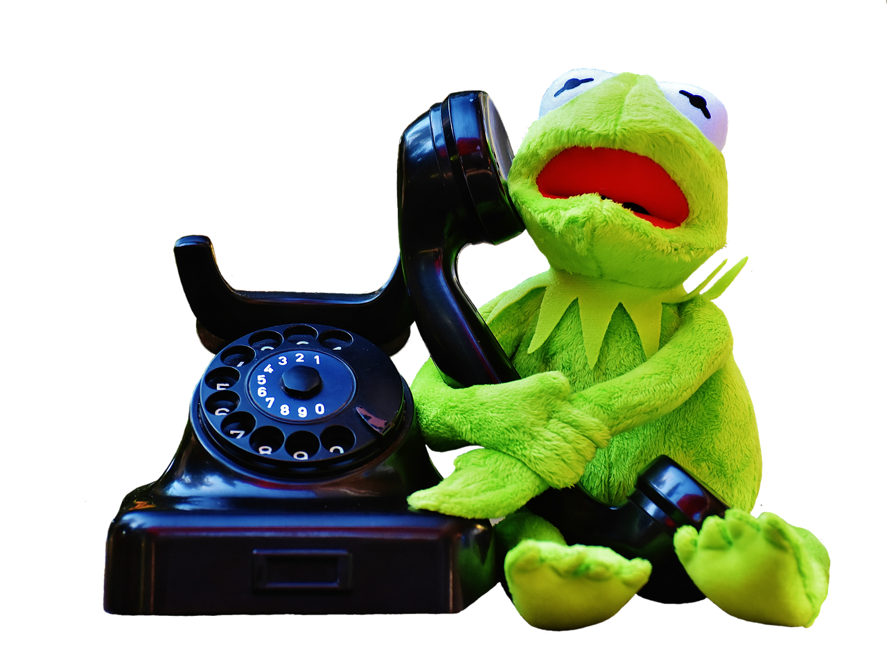 a close up of a stuffed animal on a phone, by Edward Corbett, kermit the frog, telephone, on black background, call now