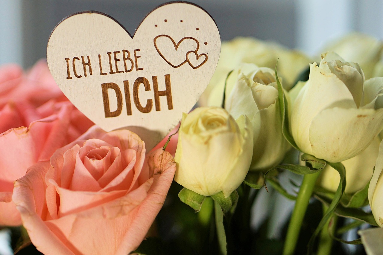 a bunch of pink and white roses in a vase, a picture, by Hilde Goldschmidt, pixabay, words, lovely couple, by rainer hosch, heart made of flowers