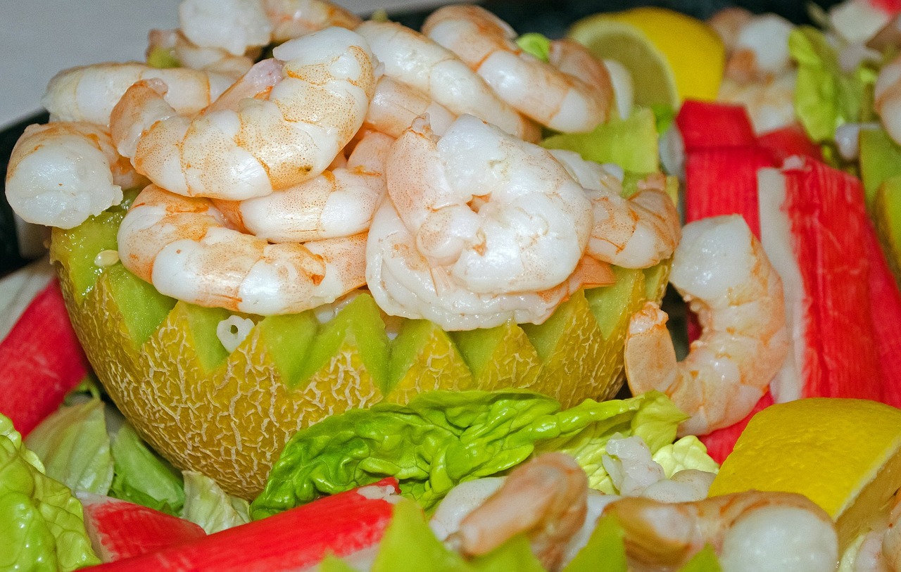 a close up of a plate of food with shrimp, by Edward Corbett, figuration libre, tropical fruit, closeup photo, salad, on ship