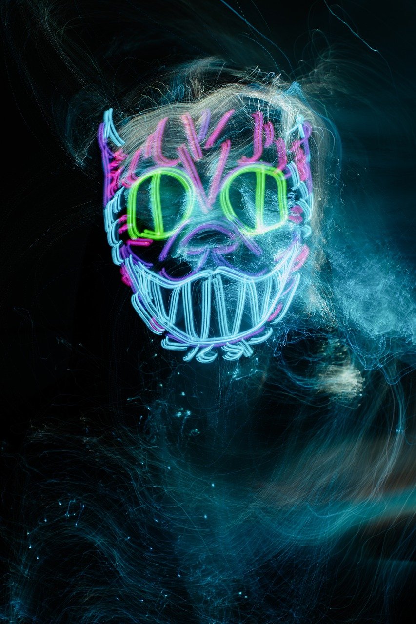 a close up of a neon mask on a black background, digital art, shutterstock, graffiti, cheshire cat, underwater glow, view from the bottom, compositing