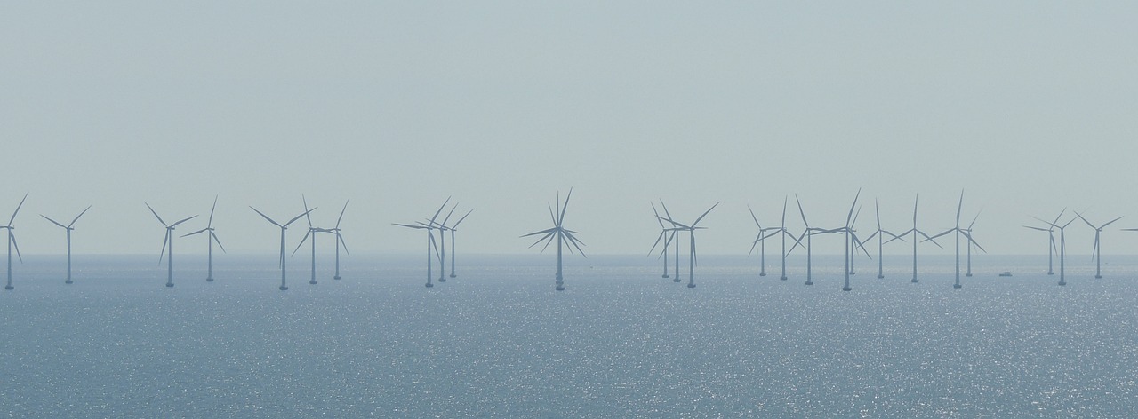 a large group of wind turbines in the ocean, a photo, sōsaku hanga, celtics, wikipedia, skydsgaard, unwind!