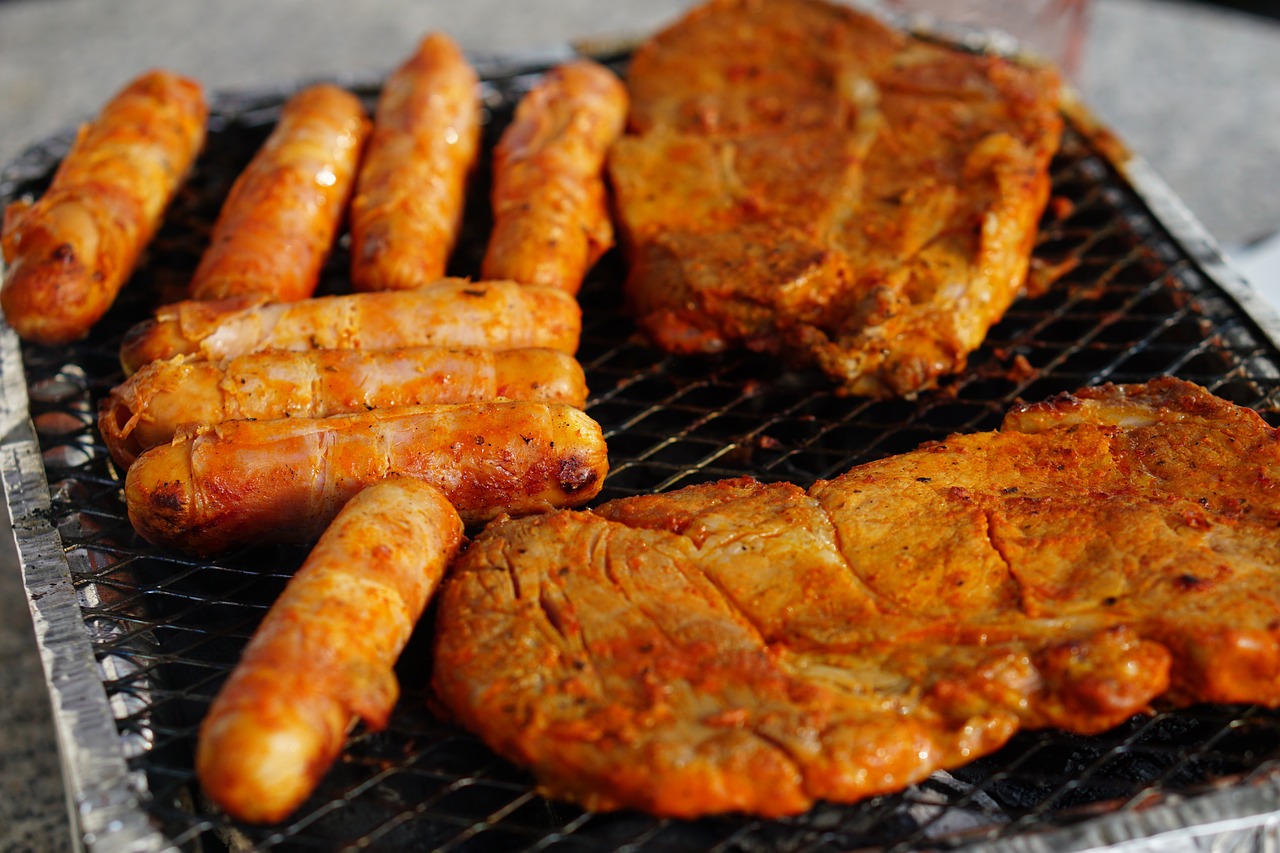 a bunch of food that is on a grill, by Kazimierz Wojniakowski, sweaty meat, istockphoto, chile, giants