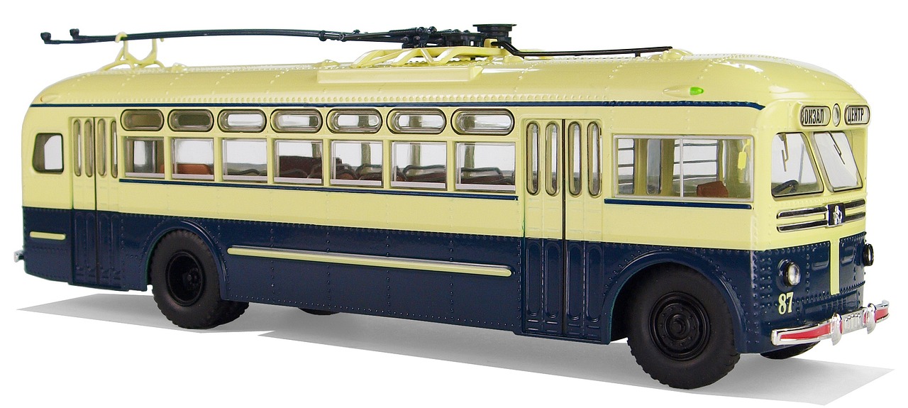 a yellow and blue bus on a white surface, by Joe Stefanelli, photorealism, model kit, street tram, 8k h- 640, thomas