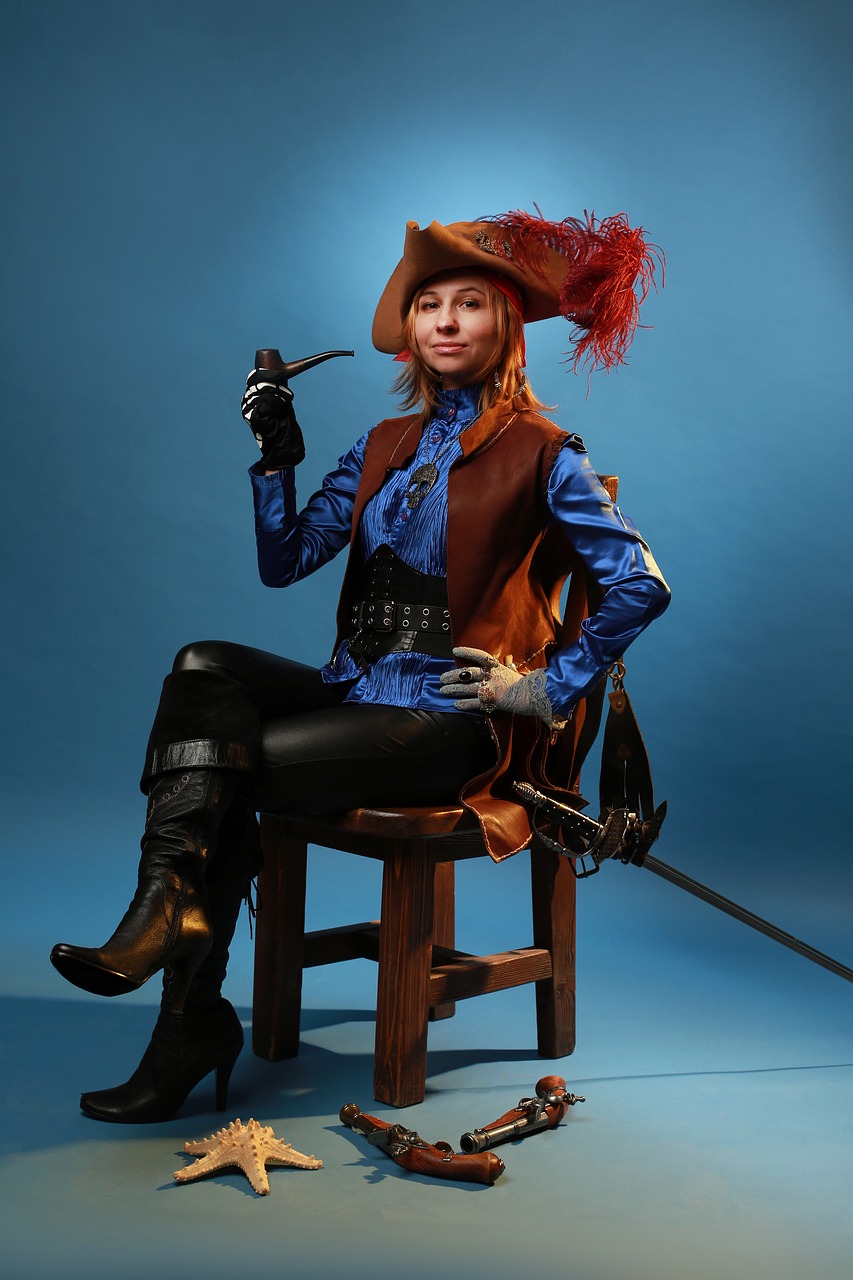a woman sitting on top of a wooden chair, inspired by Charles Gleyre, elon musk as a musketeer, cosplay photo, with a blue background, leather hunting attire