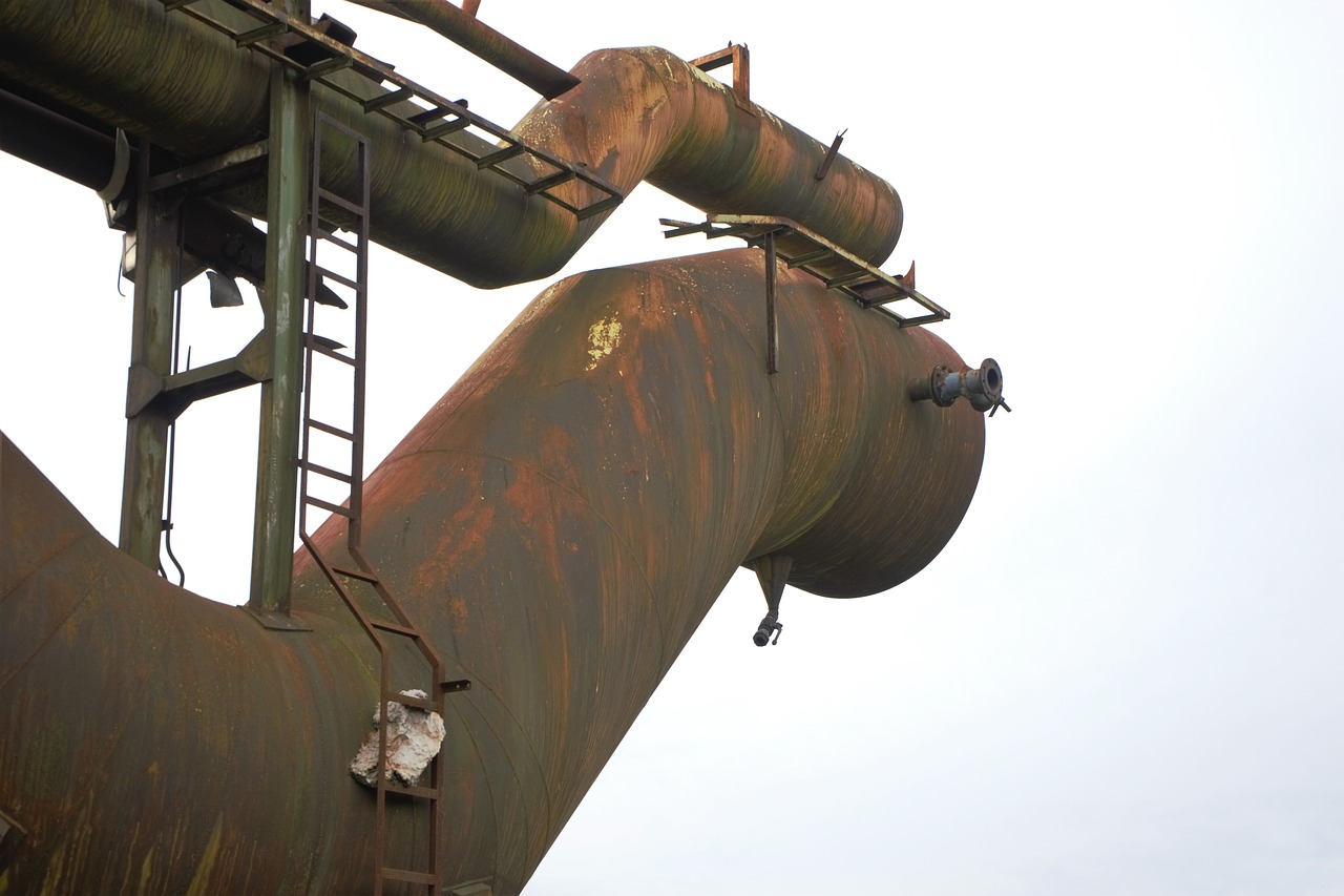 a couple of pipes that are next to each other, by Werner Gutzeit, flickr, a ancient crashed spaceship, steel mill, detail structure, massive tank