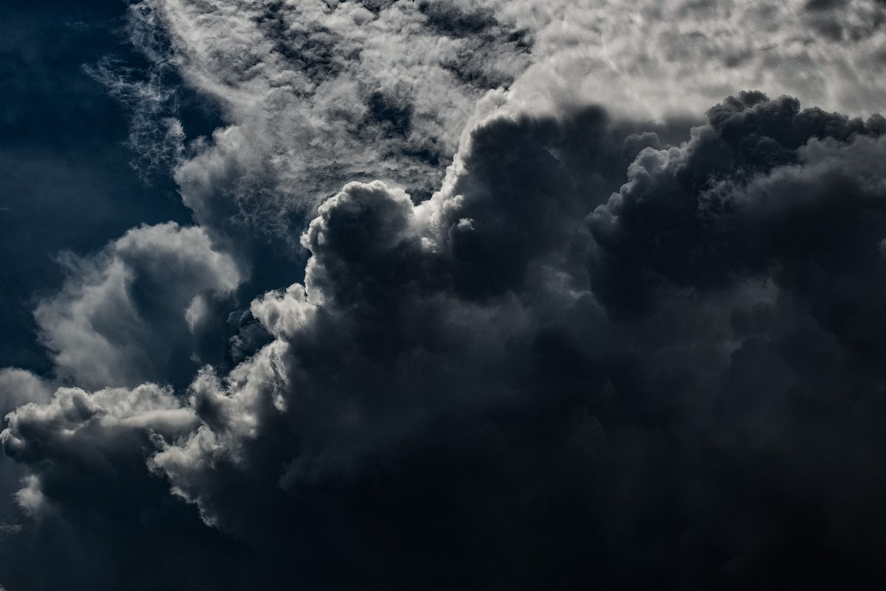 a jetliner flying through a cloudy sky, a picture, by Jan Konůpek, unsplash, precisionism, dark mammatus cloud, gustave dore\' background, dramatic closeup composition, background ( dark _ smokiness )