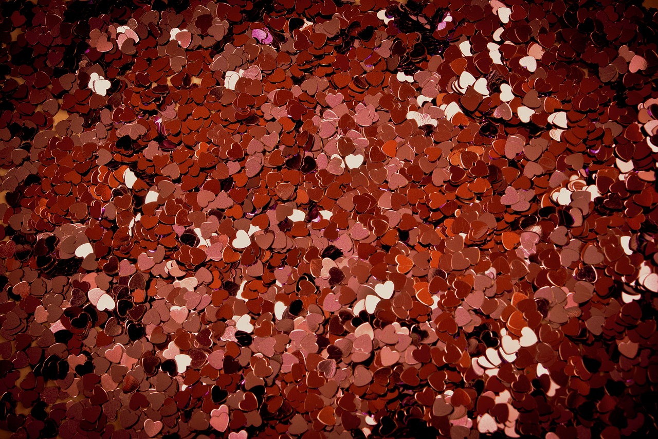 a pile of red and white confetti confetti confetti confetti confetti confetti confetti con, a photo, by Valentine Hugo, pointillism, several hearts, brown red and gold ”, dark background ”, ultrafine detail ”