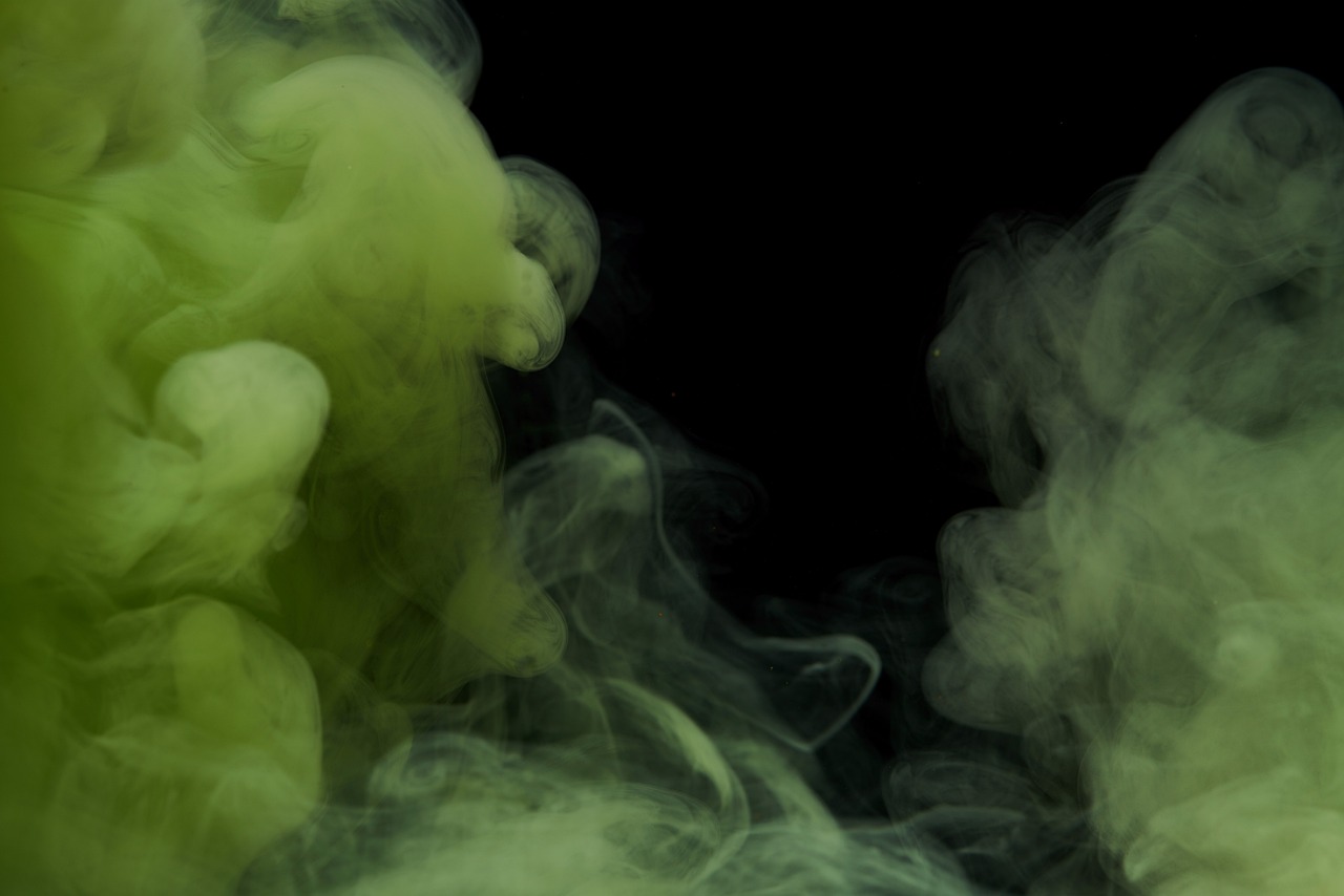 a close up of smoke on a black background, digital art, inspired by Kim Keever, shutterstock, gelatinous green goop, yellow volumetric fog, death is split in two with smoke, stock photo