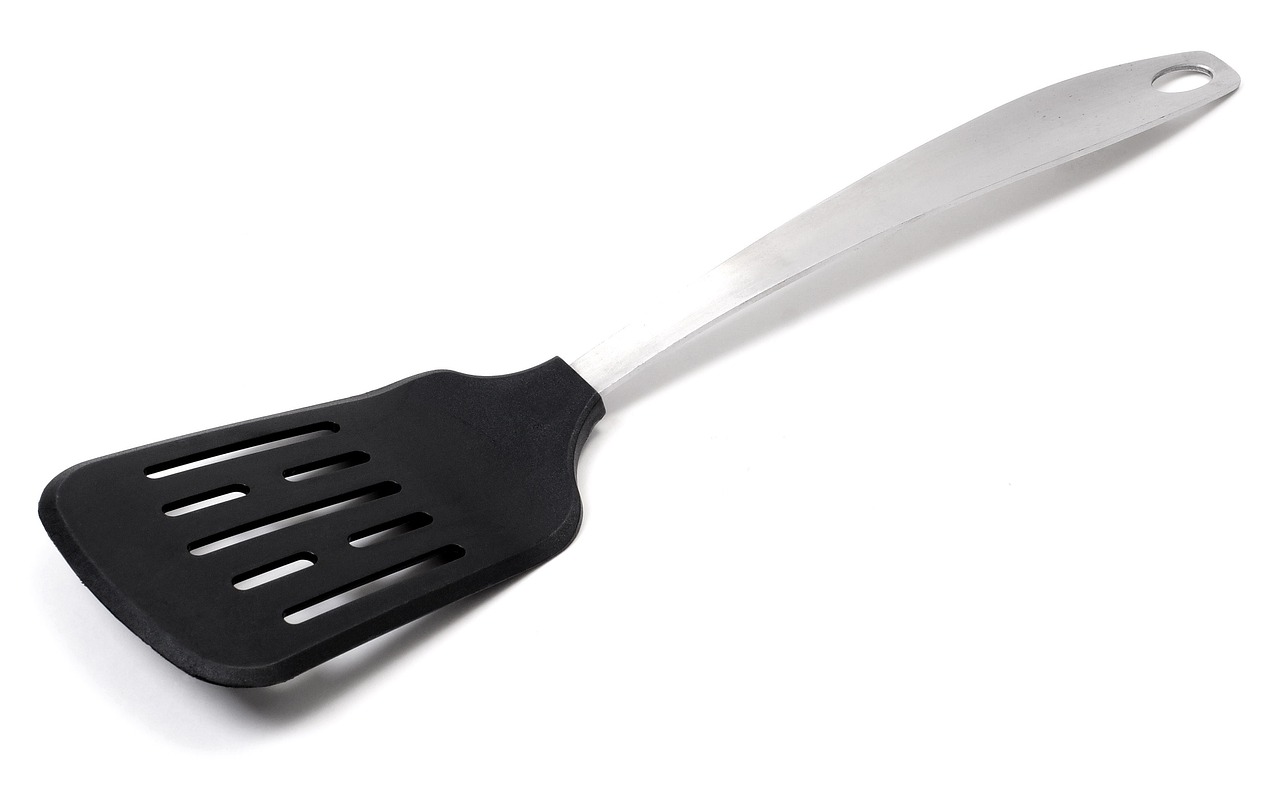 a close up of a spatula on a white surface, shutterstock, cobra, black fork, h 1088, product photograph, vsx