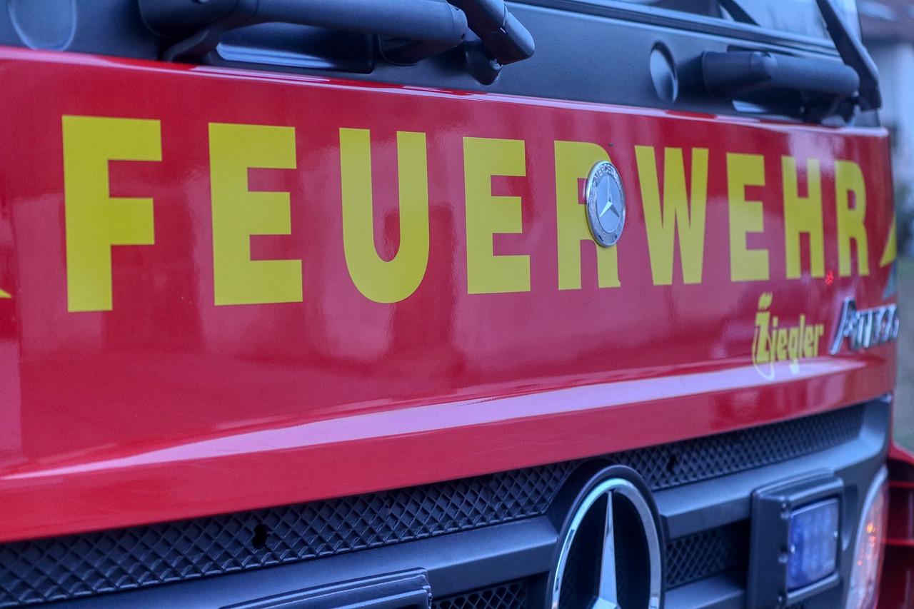 a close up of the front of a fire truck, a picture, by Robert Zünd, hurufiyya, panorama shot, gwelf, promo, eldenring