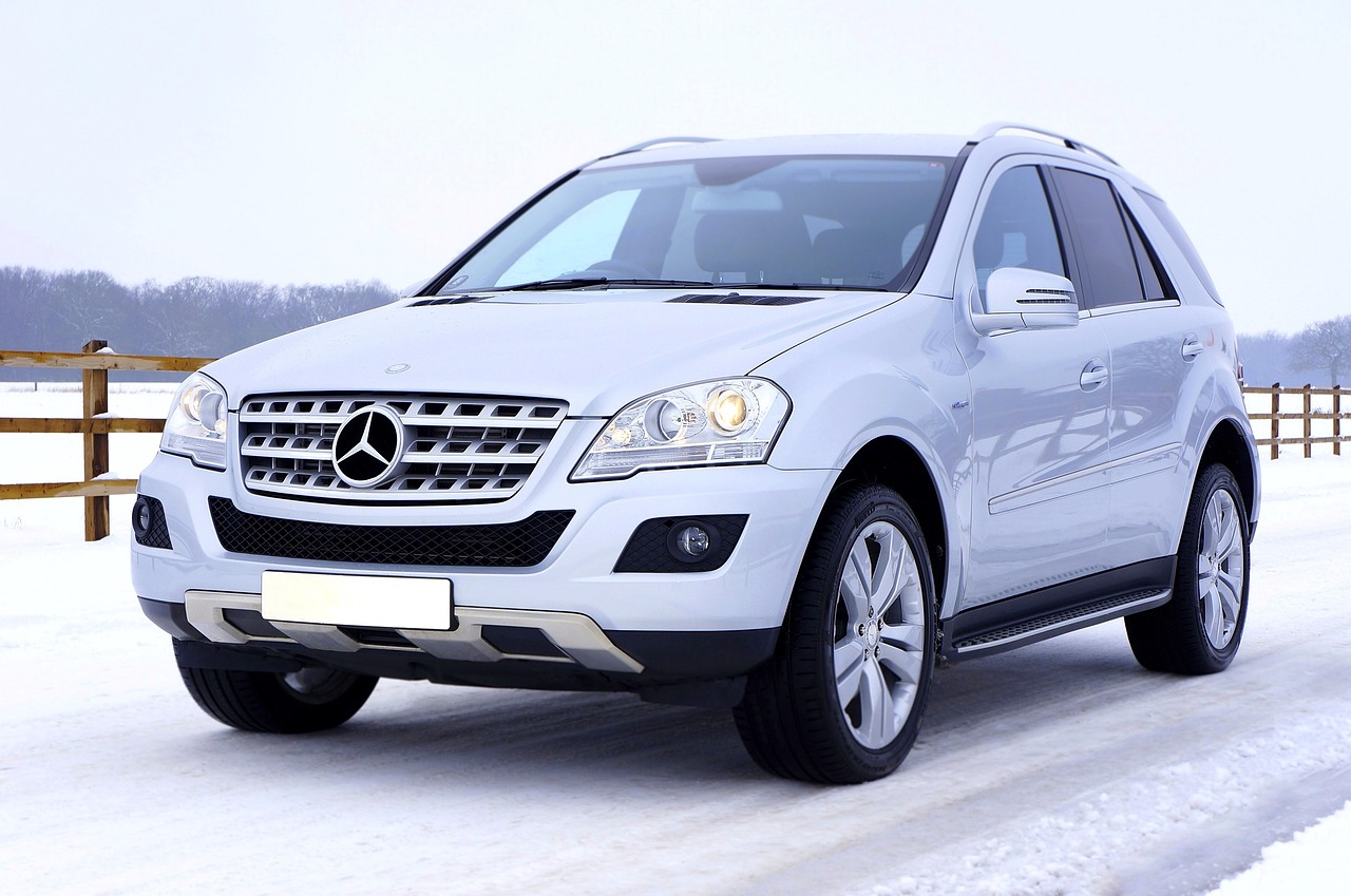 a white mercedes suv parked in the snow, a photo, pixabay, in 2 0 1 2, best on adobe stock, long front end, modern very sharp photo