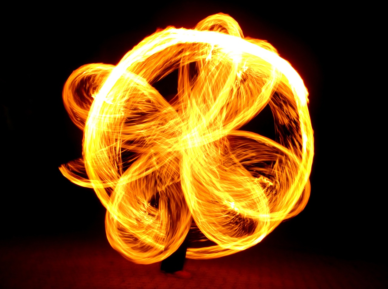 a fire spinning around in the dark, flickr, hurufiyya, yog - sothoth! yah, fireball hand, chinese ribbon dance, istockphoto