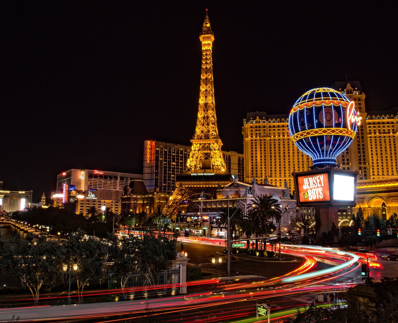 a city at night with the eiffel tower in the background, a picture, las vegas, long exposure photo, usa-sep 20, viral photo