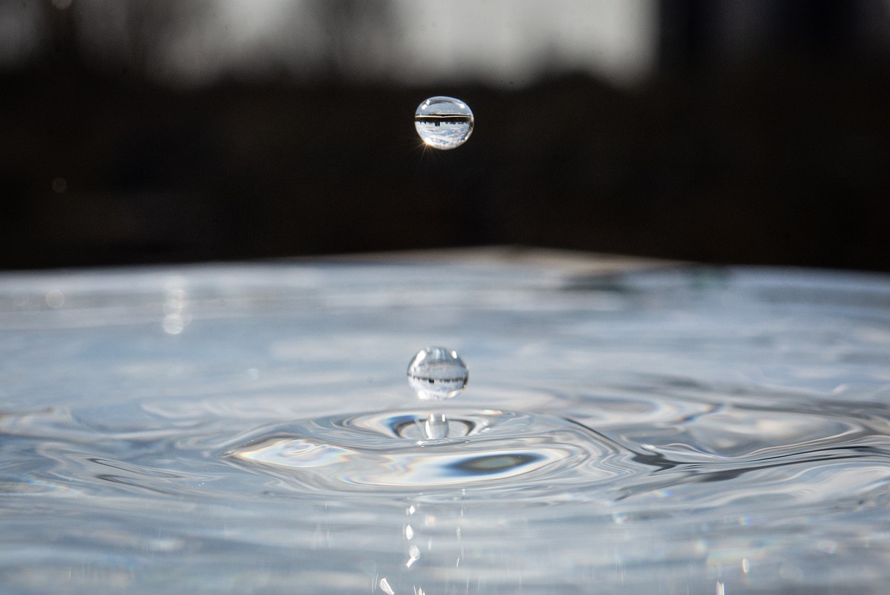 a drop of water falling into a pool of water, renaissance, rising in the air levitating, subtle wear - and - tear, blog-photo, wetcore